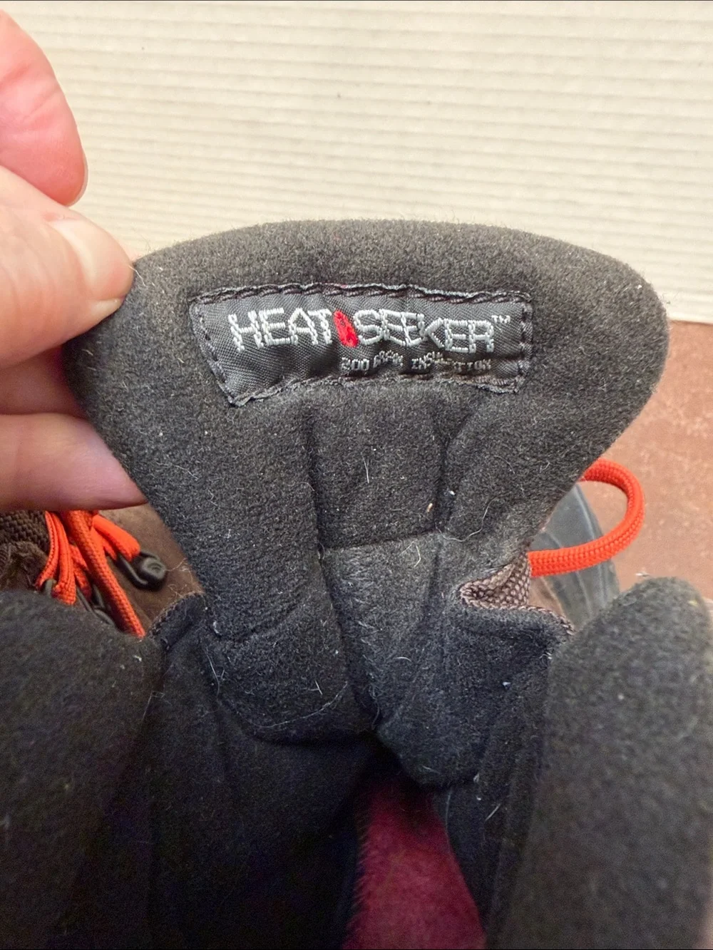 The North Face Kids Brown and Black Winter Boots with Orange Laces